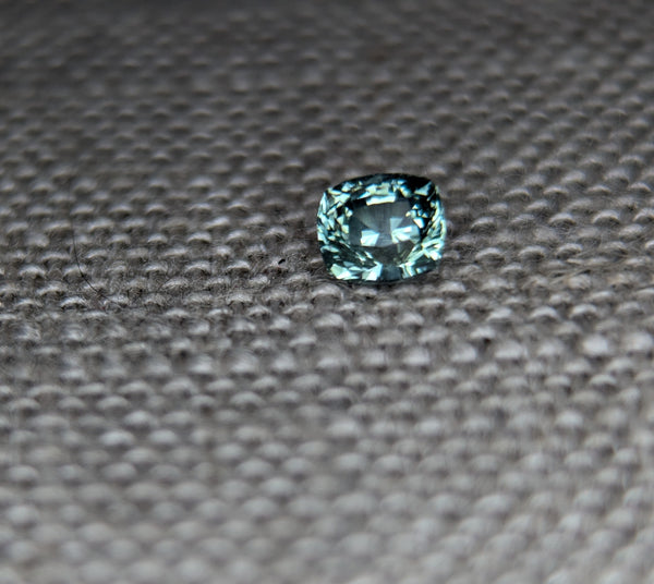 .58 CTS. CUSHION CUT BLUE/GREEN MONTANA SAPPHIRE