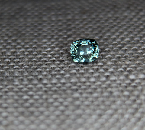 .58 CTS. CUSHION CUT BLUE/GREEN MONTANA SAPPHIRE