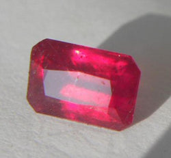 RUBY ,EMERALD CUT BRIGHT RED 1.48CTS. 7MM. X 4MM. - Blaze-N-Gems